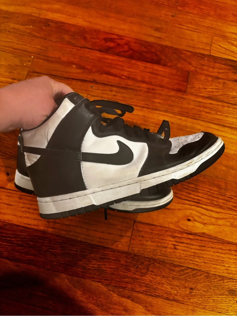 Nike Black and White women’s High-Top Sneakers